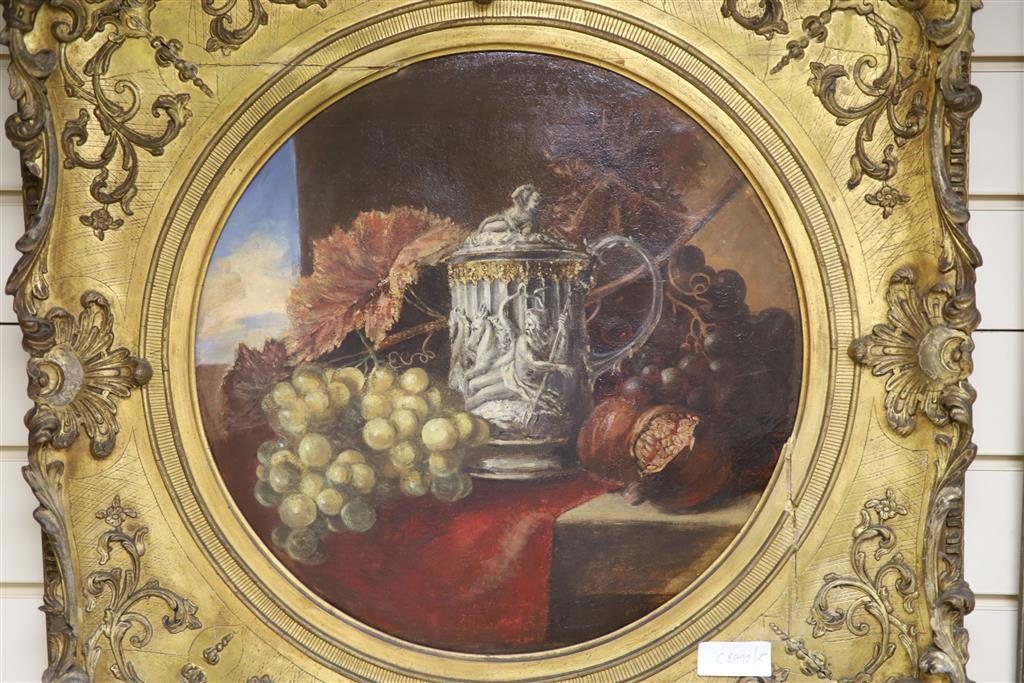 Victorian School, oil on canvas, Still life study of an ivory flagon and fruit upon a ledge, tondo, 42cm
